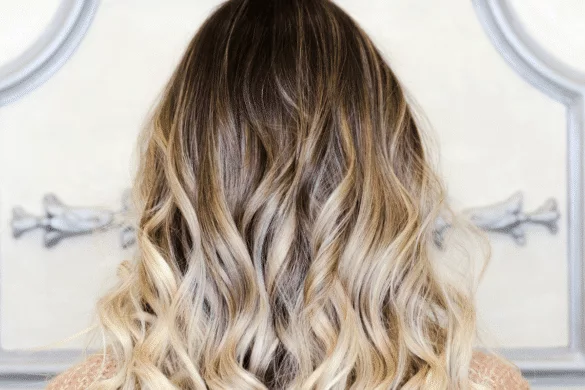 Back of a woman's head with Balayage highlights